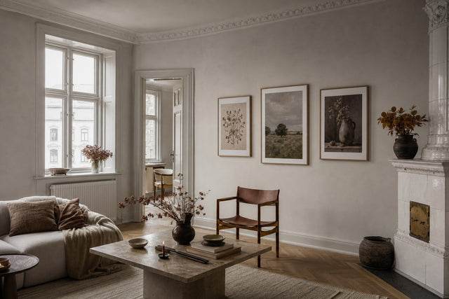 Nordic editorial seasonally styled Nordic living space featuring framed wall art and restrained seasonal details that directly express the article theme