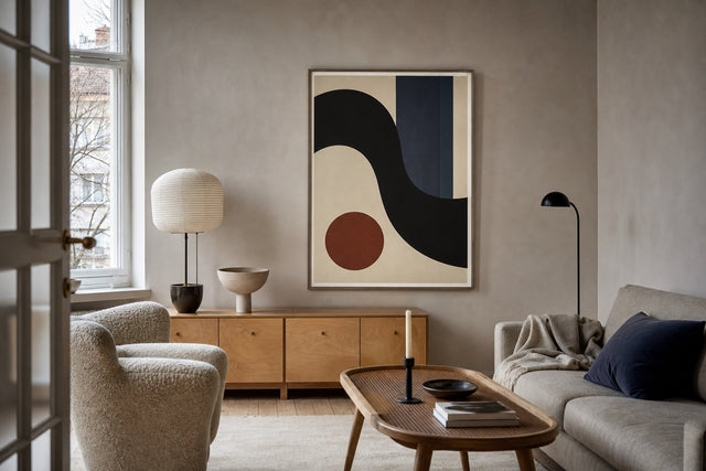 Nordic editorial refined Nordic living room featuring carefully composed framed-art vignette that directly illustrates the article subject
