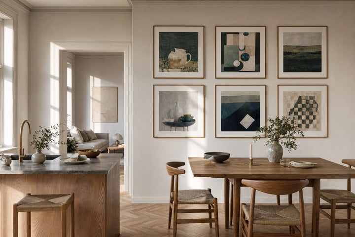 Nordic editorial Nordic kitchen and dining area featuring topic-relevant framed art placed safely away from heat and moisture