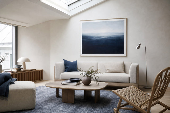 Nordic editorial editorial Nordic living room featuring framed art and restrained furnishings built around the exact colour theme in the title