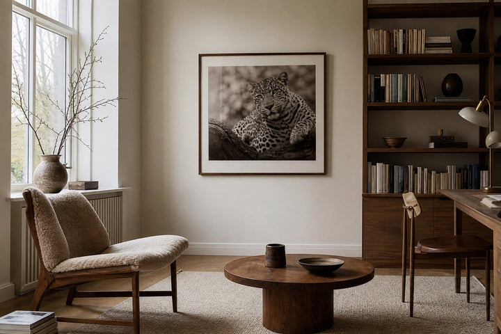 Nordic editorial quiet Nordic reading room featuring one or two elegant framed motifs that clearly reflect the animal or celestial subject