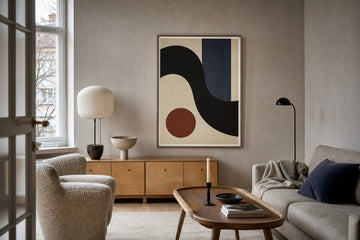 Nordic editorial refined Nordic living room featuring carefully composed framed-art vignette that directly illustrates the article subject