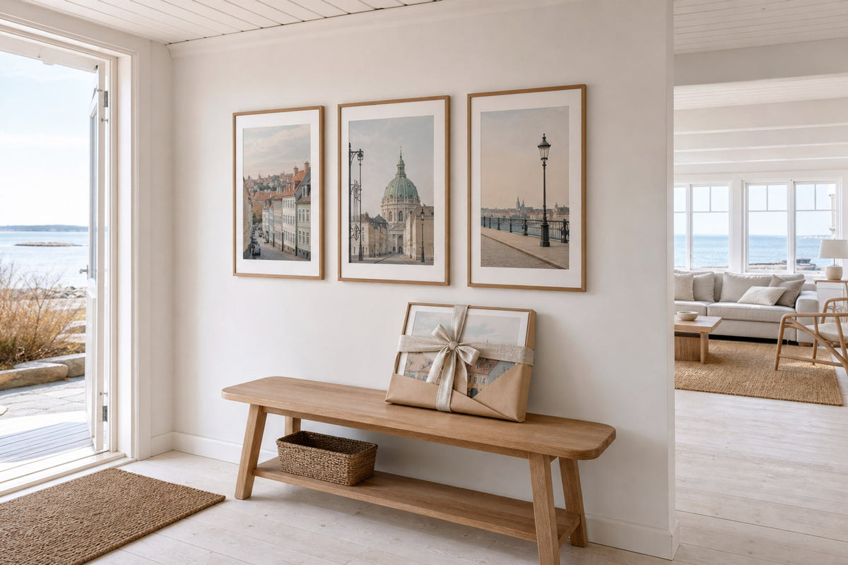Nordic editorial quiet Nordic entry or living room featuring beautifully wrapped framed art presented as a thoughtful gift beside a finished interior vignette