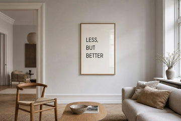 Nordic editorial refined Nordic living room featuring carefully composed framed-art vignette that directly illustrates the article subject