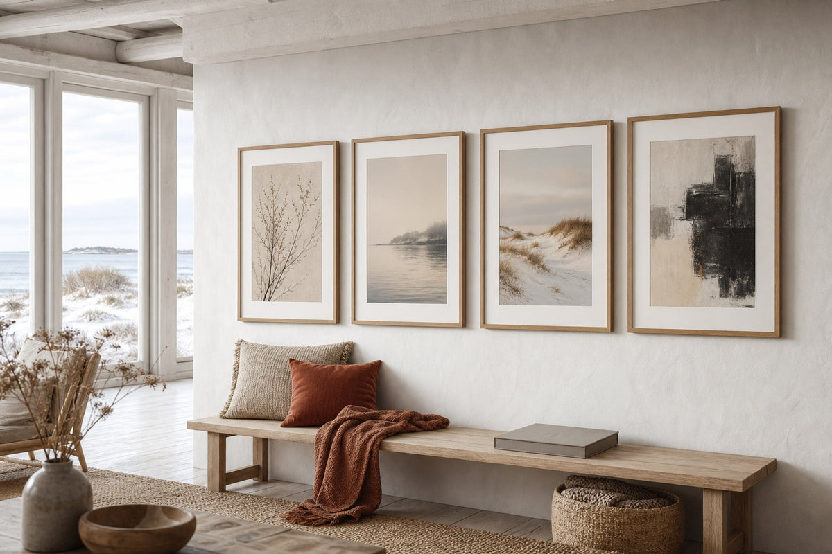 A warm Nordic winter room with calm framed wall art and subtle cold-season textures