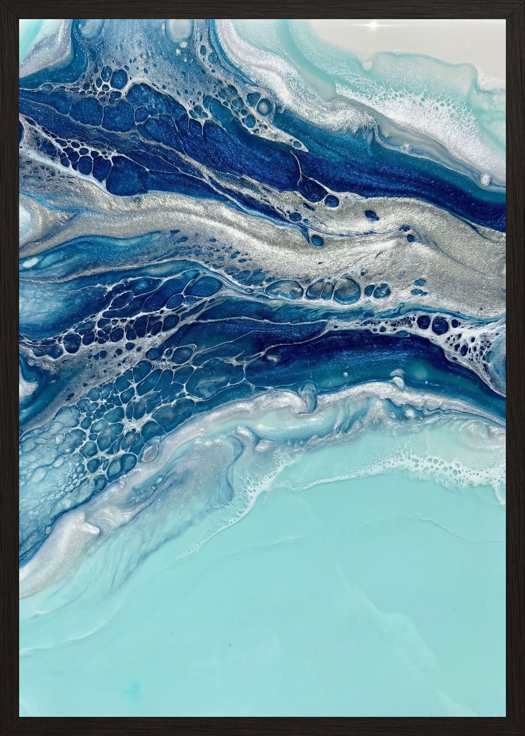 Poster in black frame