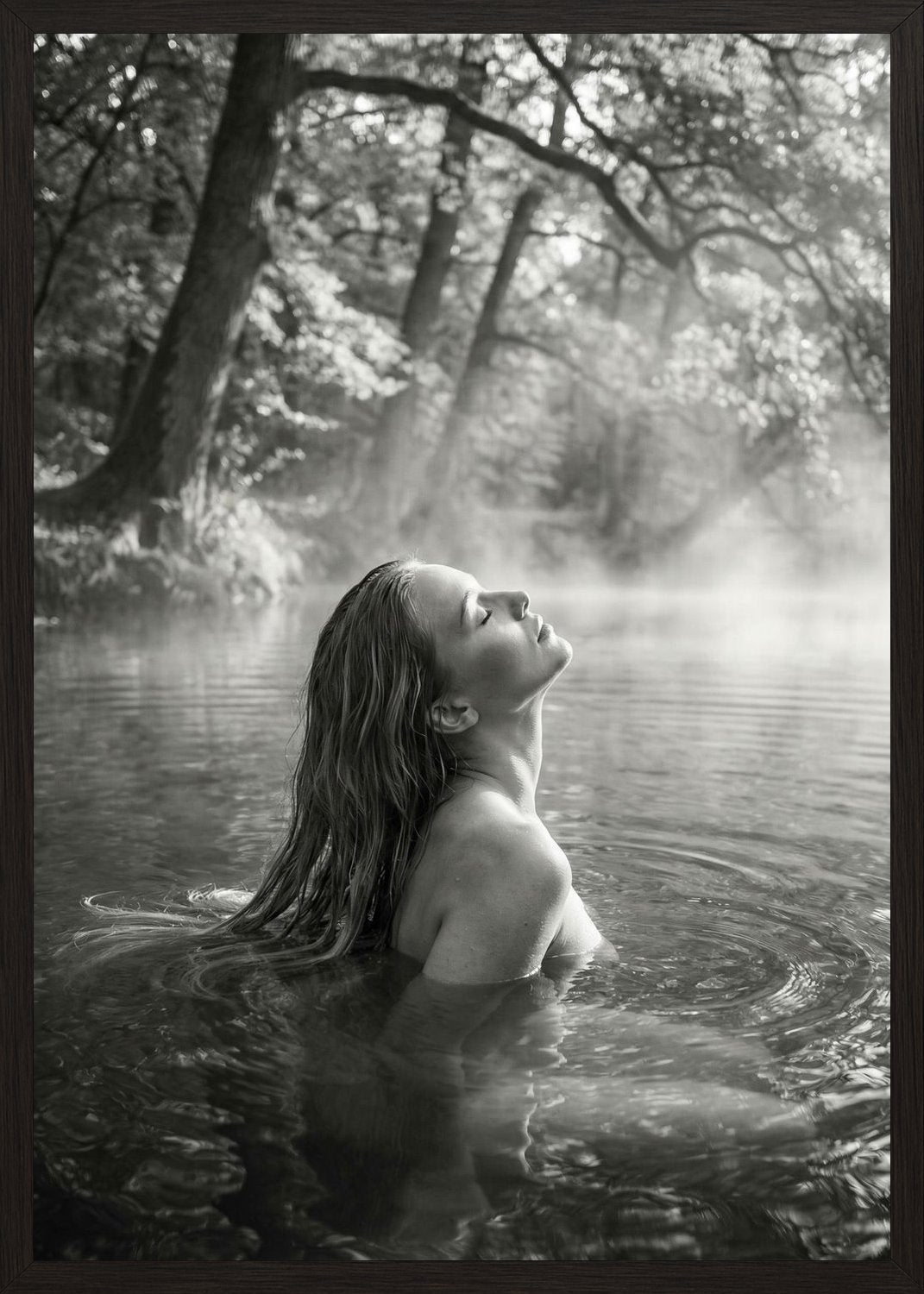 Poster in black frame