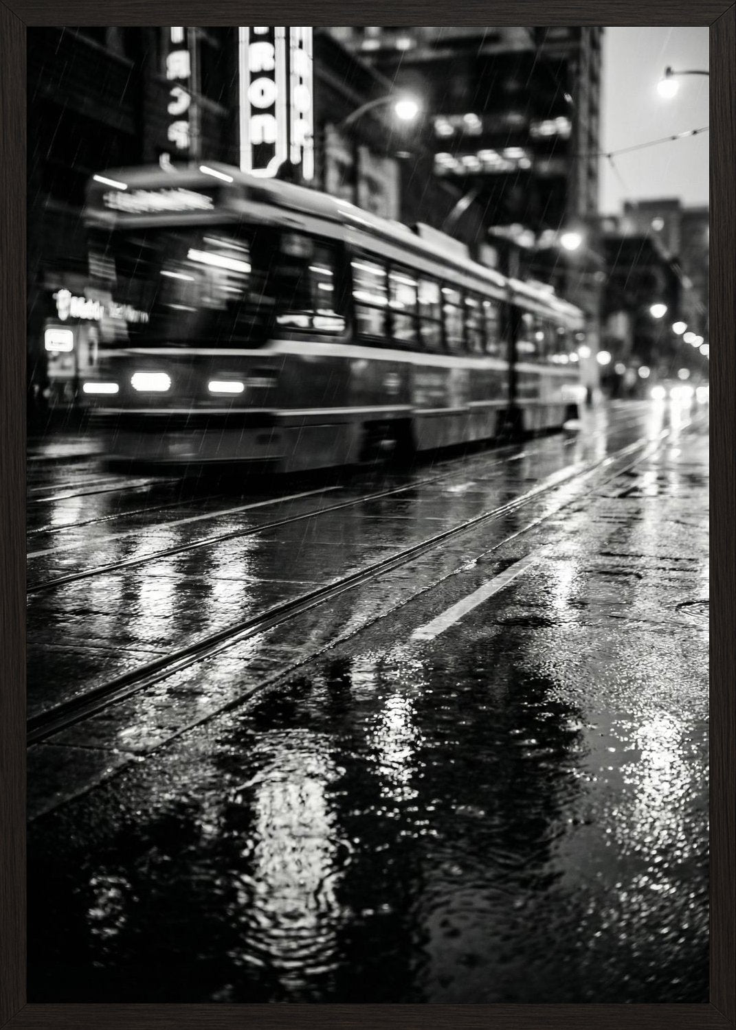 Poster in black frame