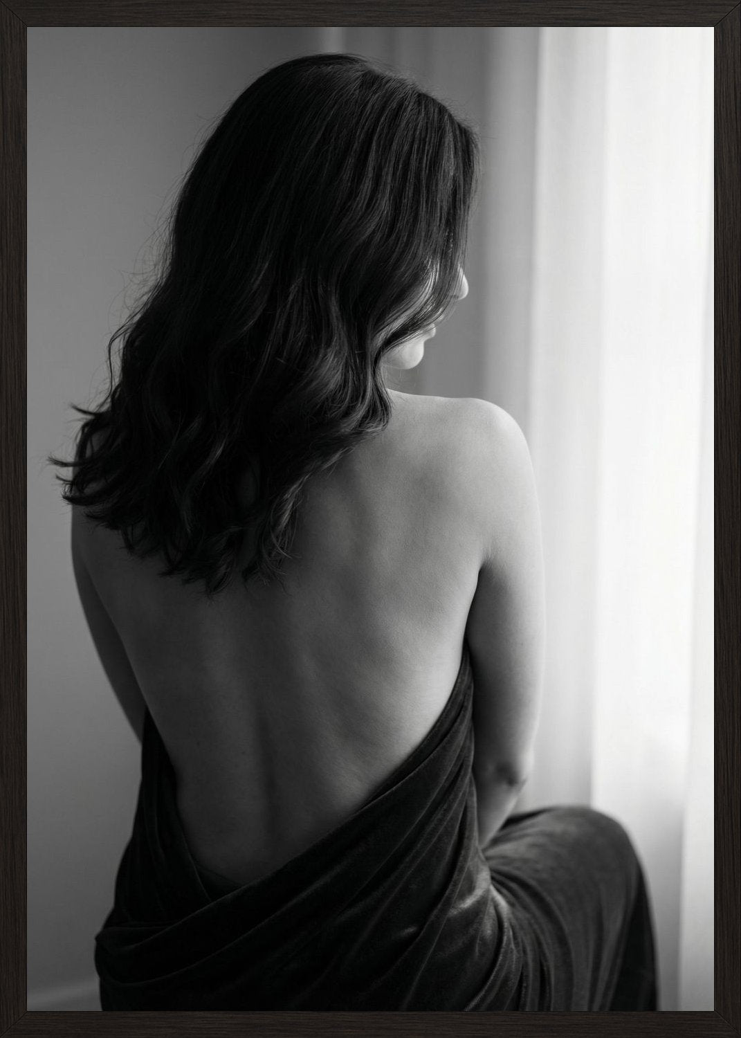 Poster in black frame