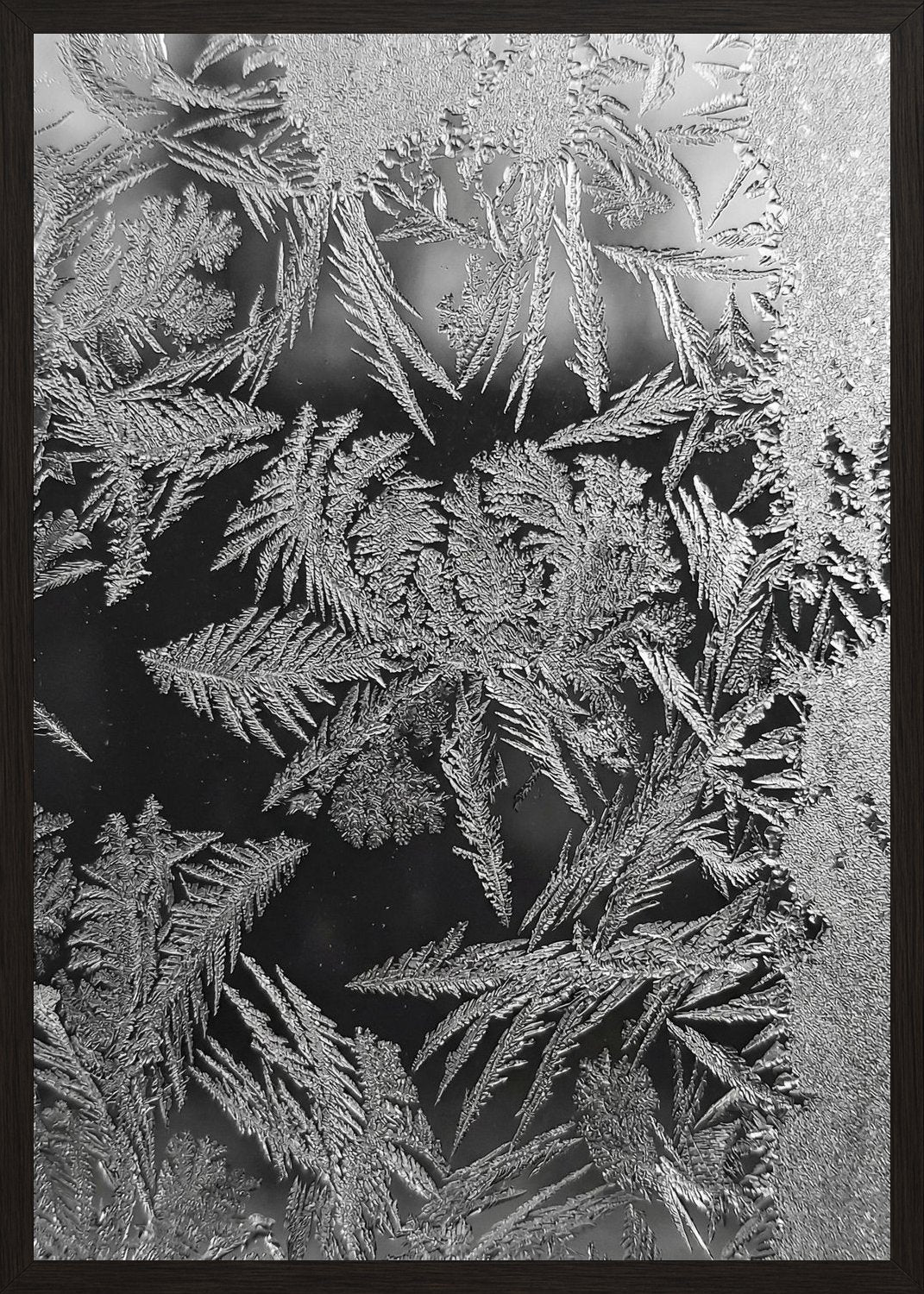 Poster in black frame