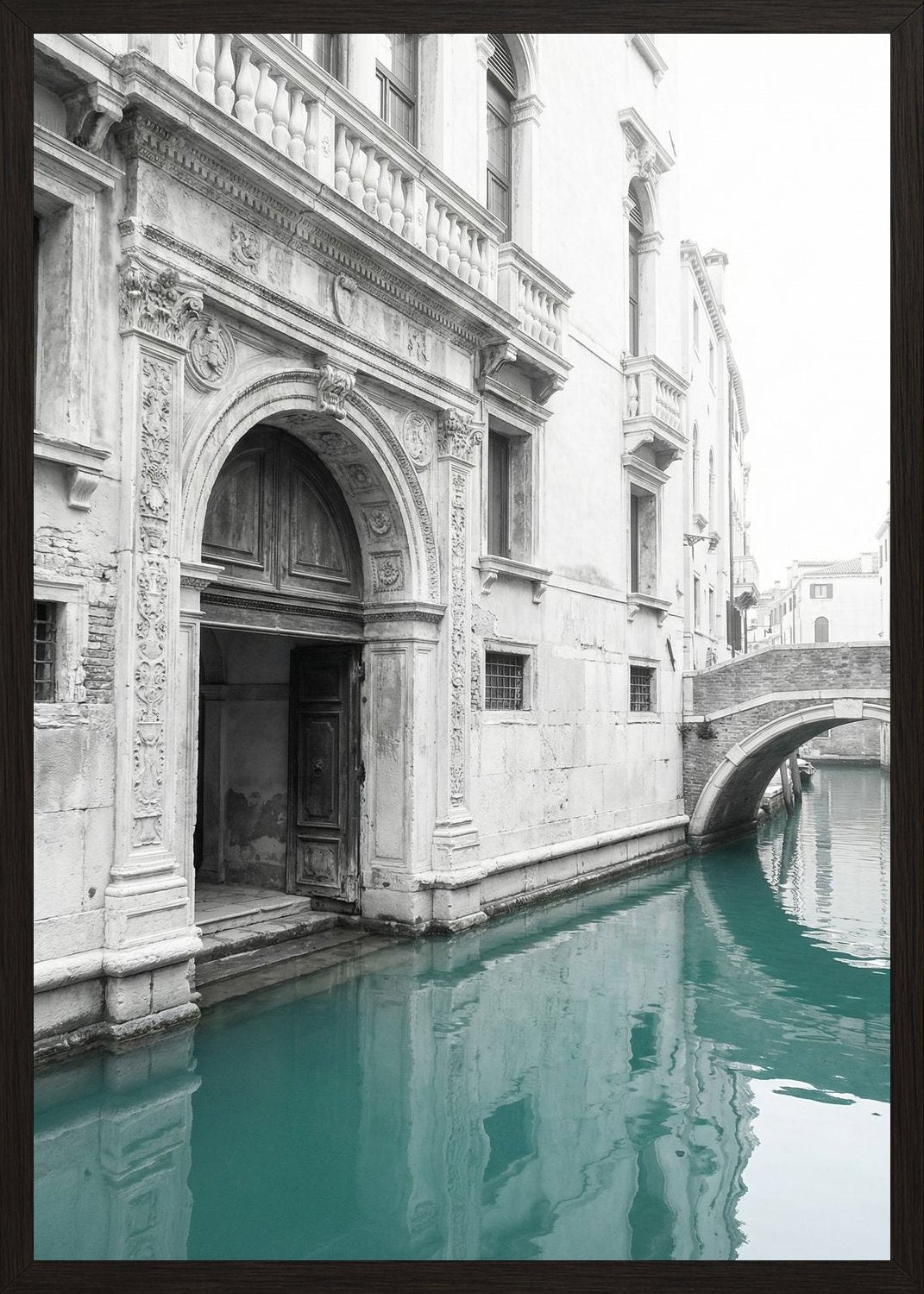 Poster in black frame